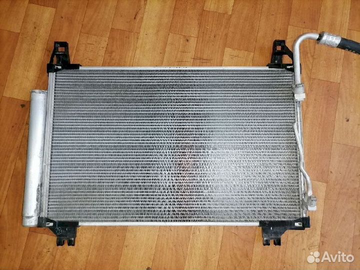 Радиатор кондиционера Toyota Vitz XP90