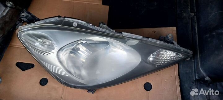 Фара Honda FIT перд. правая