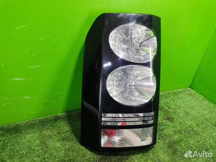 Фонарь задний наружный левый Land Rover Discovery