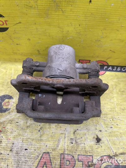 Суппорт задний левый Toyota Avensis T250 1zzfe