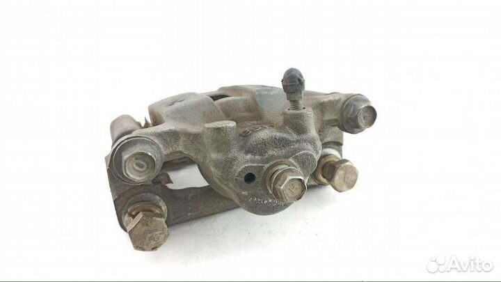 Суппорт задний левый Nissan X-Trail NT30 2003