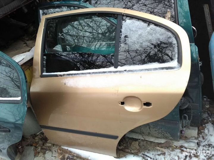 Дверь задняя левая Skoda Octavia Tour A4