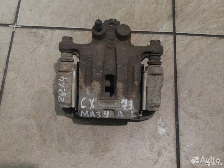 Тормозной суппорт задний левый Mazda сх7