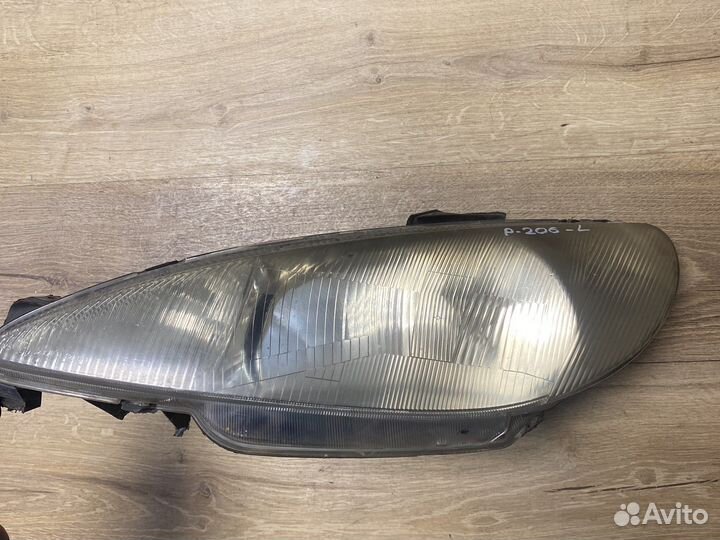Peugeot 206 передняя левая фара