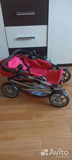 Детская игрушечная коляска