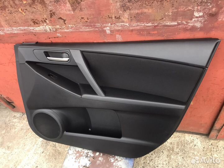 Обшивка двери (карта) Mazda 3 BL 2010