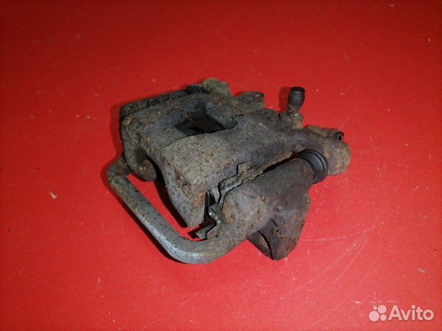 Суппорт задний правый Nissan Qashqai J10 MR20DE