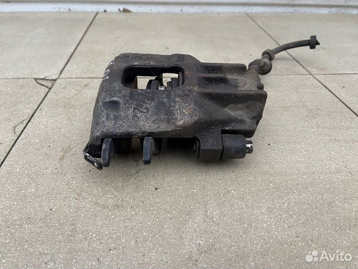 Тормозной суппорт передний правый Ford Focus 1