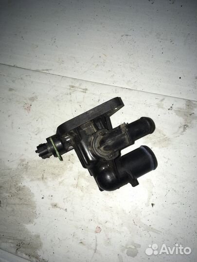 Корпус термостата Opel Astra J 1.3cdti