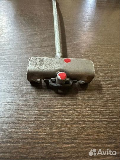 Тросик ручника Renault Logan