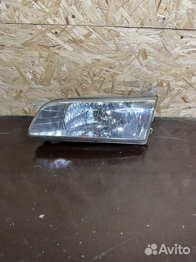 Фара Toyota Corolla AE110 левая