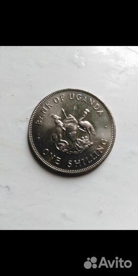 Монета 1 шиллинг Уганда 1975. 1976год