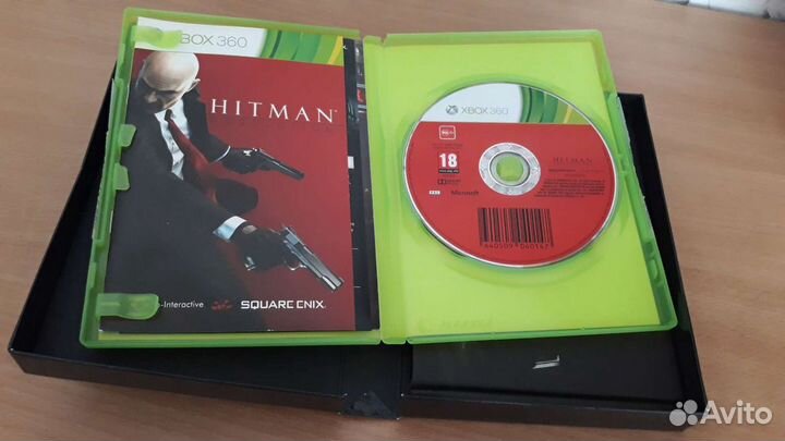 Игра Hitman Absolution для Xbox 360 и сам Хитмэн