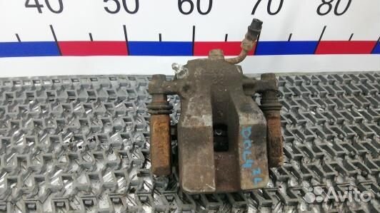 Суппорт тормозной задний левый toyota RAV 4 ZSA3