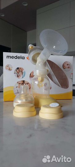 Молокоотсос medela ручной