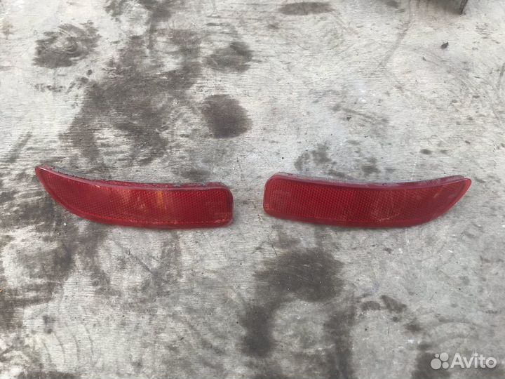 Катафот заднего бампера Renault Logan