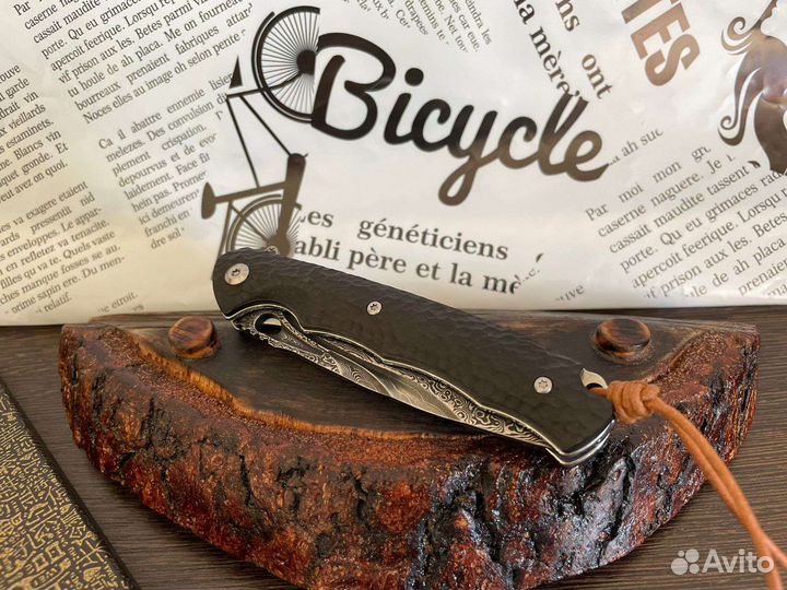 Складной нож из дамасской стали