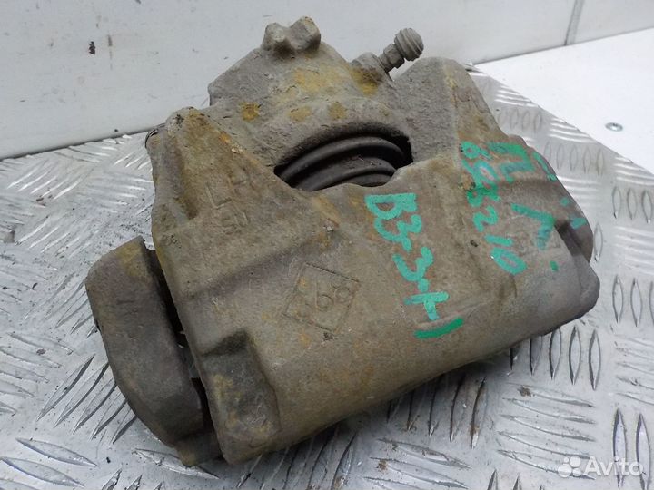 Суппорт тормозной передний левый Renault Fluence 2