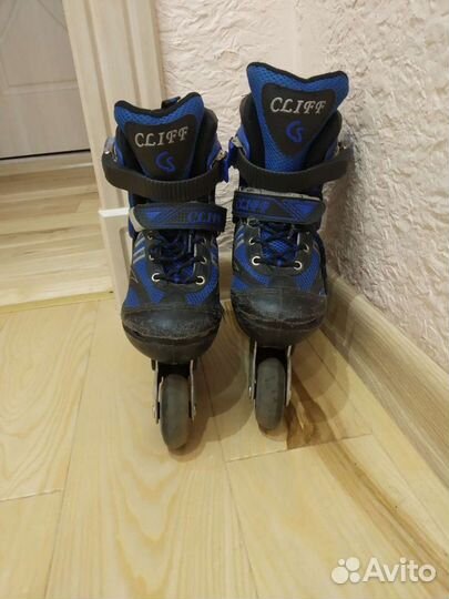 Роликовые коньки