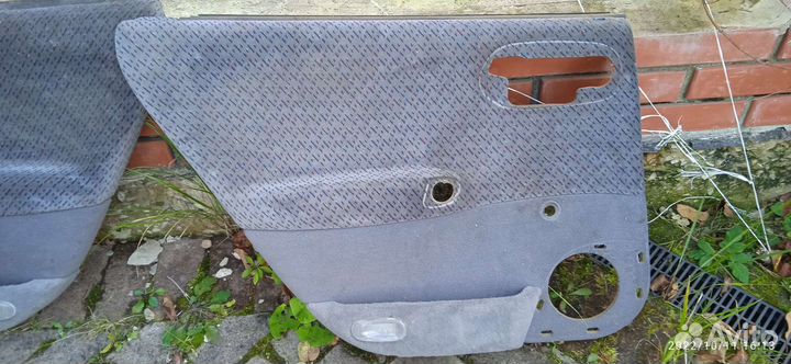 Обшивка двери Опель Вектра б