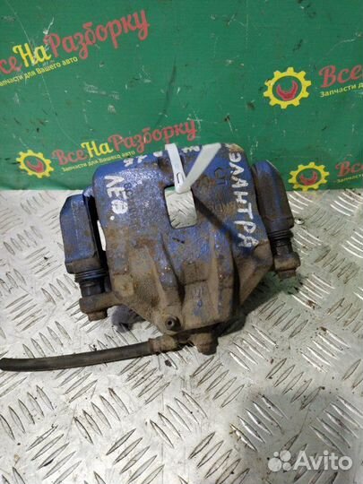 Суппорт передний левый Hyundai Elantra седан 1.6Л