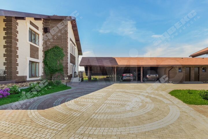 Коттедж 446 м² на участке 26 сот.