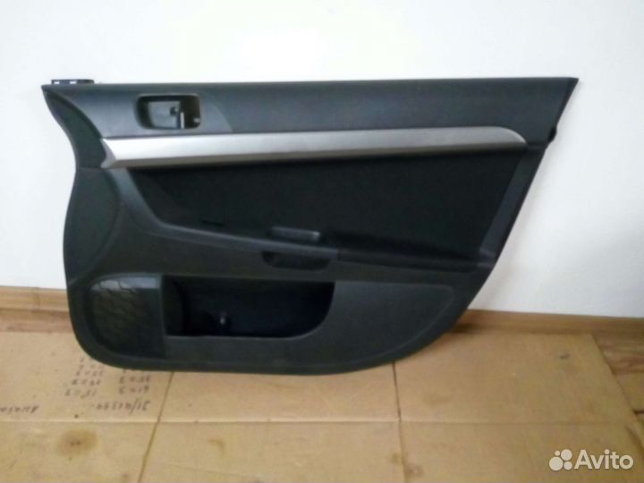 Обшивка двери Mitsubishi Lancer X 10