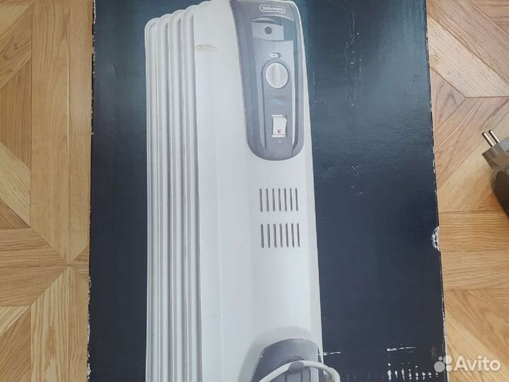 Масляный обогреватель delonghi
