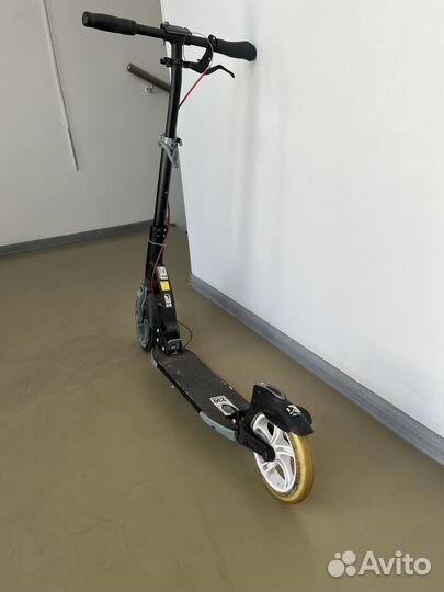 Самокат взрослый Reaction