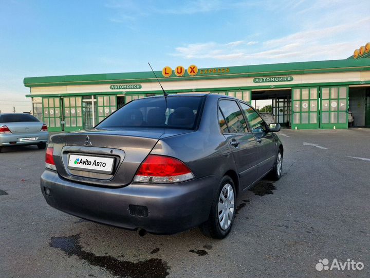 Mitsubishi Lancer 1.6 МТ, 2005, 230 000 км