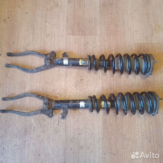 Передние стойки mazda 6 gg