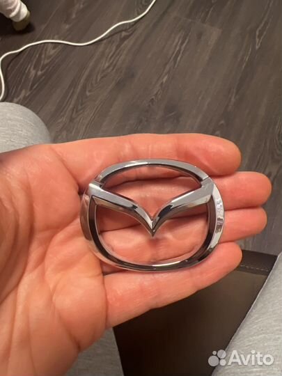 Эмблема руля mazda 3 bk