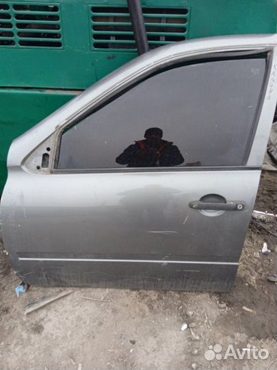 Дверь боковая передняя левая Лада Калина