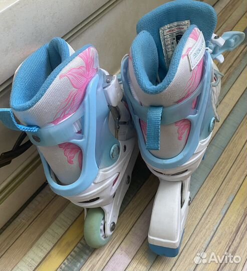 Роликовые коньки