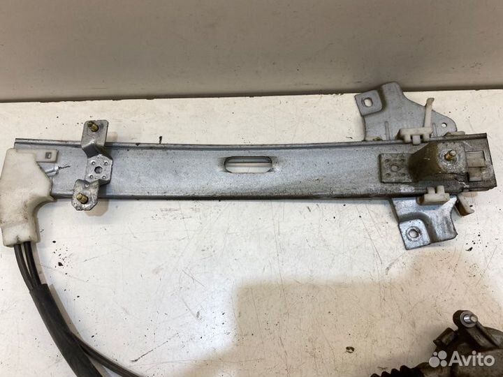 Мотор стеклоподъемника задний правый Kia Spectra