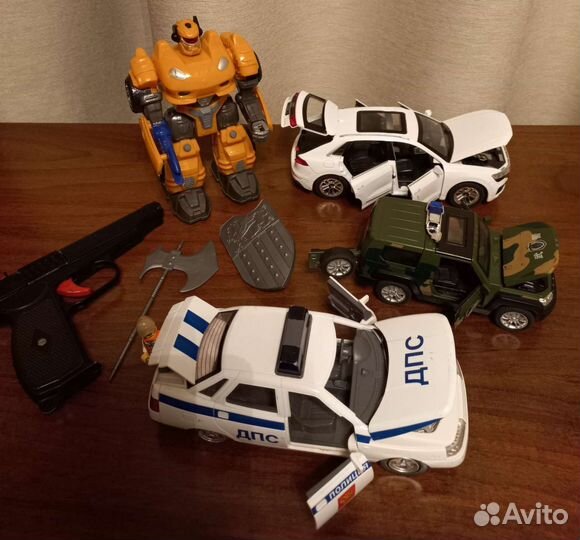 Динозавры,робот,нож,машинки,мяч,звуковые игрушки