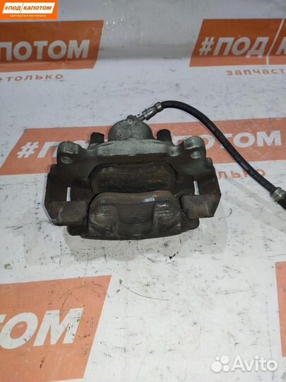 Суппорт тормозной передний правый Volkswagen Caddy