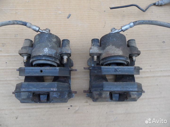 Суппорт тормозной передний Шкода Октавия А5