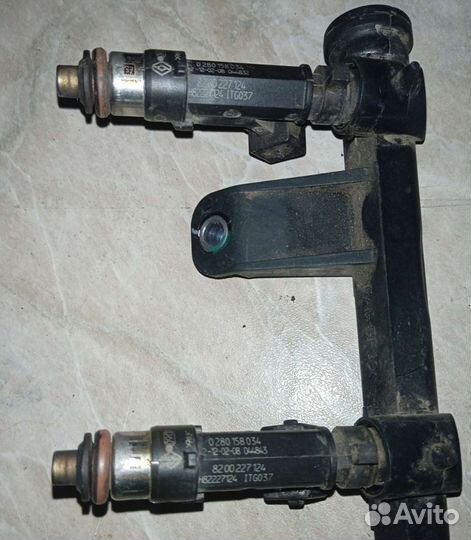 Форсунка топливная Renault Logan 8200227124