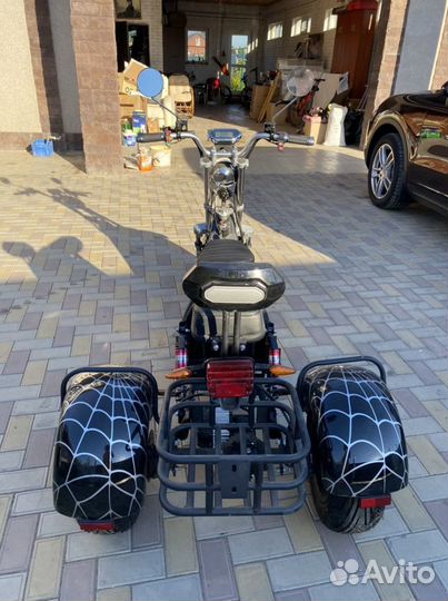 Электроскутер трицикл