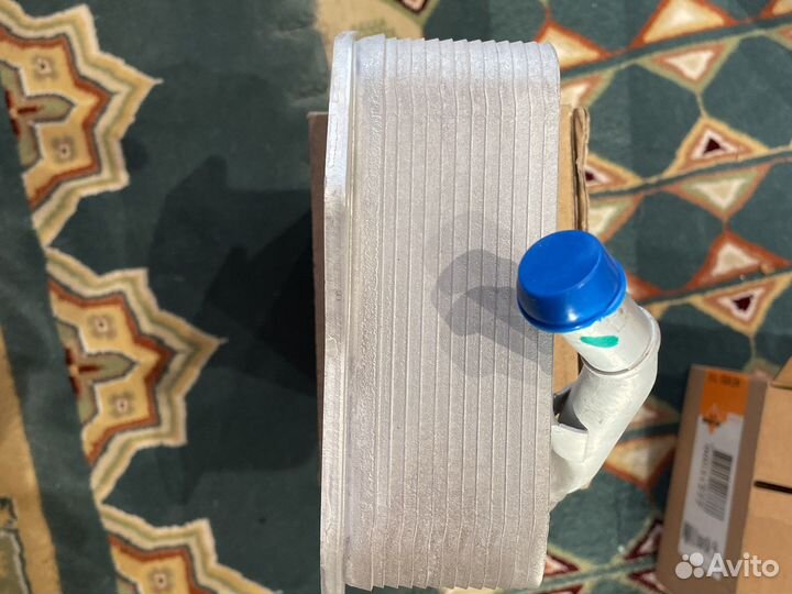 Радиатор охлаждения масла двигателя