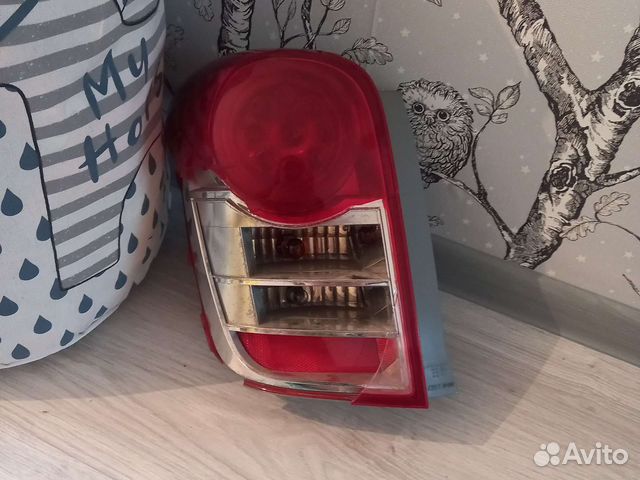 Фонарь(стоп сигнал)задний левый на Филдер