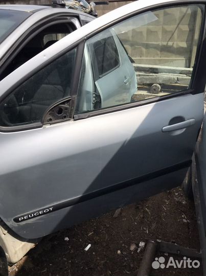 Дверь передняя левая Пежо 307 (552)