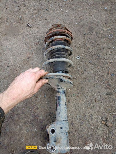 Амортизатор стойка передний левый Toyota Starlet