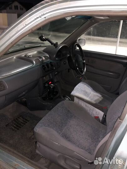 Nissan March 1.0 AT, 1999, 110 000 км