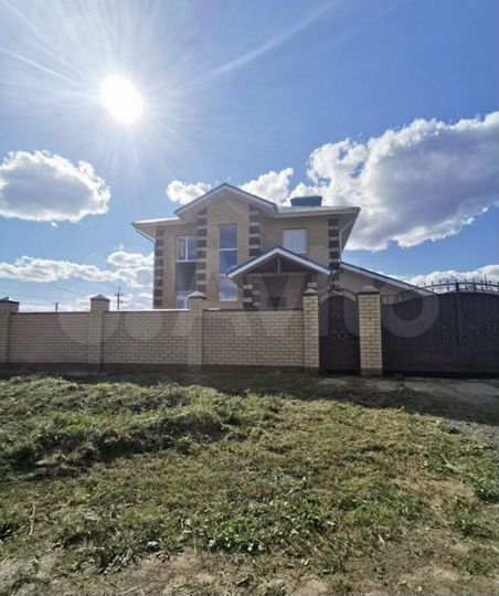 Коттедж 296 м² на участке 12 сот.