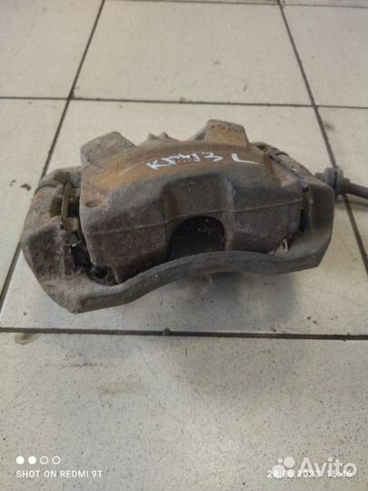 Суппорт тормозной передний левый Chevrolet Cruze