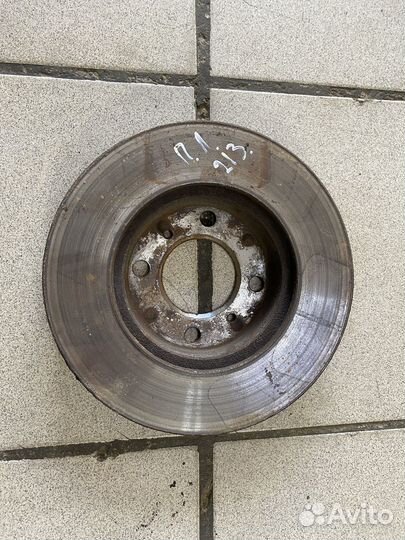 Тормозной диск передний Mitsubishi Lancer VII