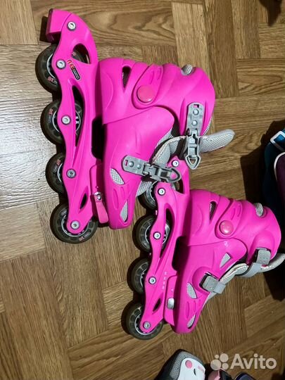 Роликовые коньки