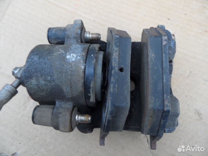 Суппорт тормозной передний Шкода Октавия А5